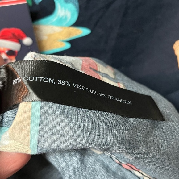 Denim & Flower Ricky Singh
Christmas Santa Claus on Beach, Drinking - Picture 3 of 4